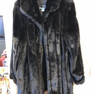 A 3/4 length Black faux fur Dennis Basso coat new no tag size clothes.